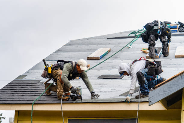 Professional Gutter Installation technician working in Rollingbay, WA